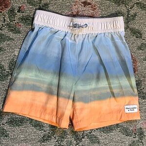 Abercrombie kids swim trunks 7/8 
Great condition 
Blue green & Orange